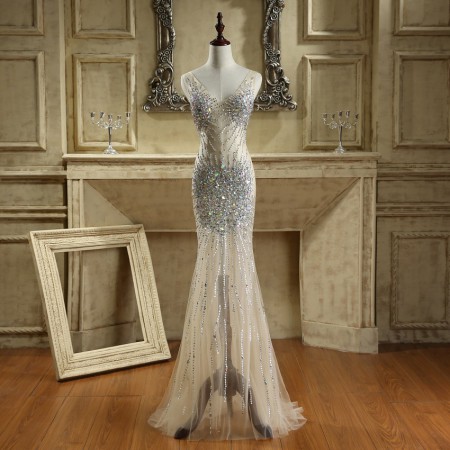 /products/vestido-con-pedreria-transparencia/